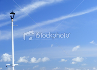 ist2_7469803-white-victorian-lampost-against-cludy-blue-sky