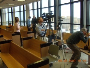 DSCN1525 Associated Press reporter Brian Sokoloff (sitting) updates his story as award-winning Palm Beach Post photographer Lannis Waters (R), who took the bulk of the trial photos, and local broadcaster Al Pefley eye the cloud.