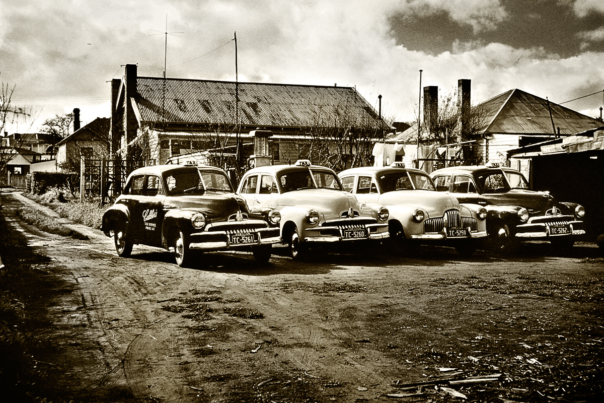 Cuttler Taxi Fleet_Hamilton_Victoria_B&W Reproduction of an old color photograph with a split toned black-and-white rendering