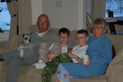 Dad, Mother, Oldest Boy, Middle Boy, and Mary relaxing - Christmas 2008