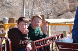 Oldest Boy and Middle Boy riding the zoo train - March 2009