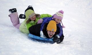 Sledding pig pile