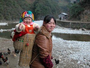 Woman with her child in China Woman with her child in China